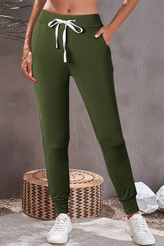 Moosgrüne jogginghose mit kordelzug an der taille