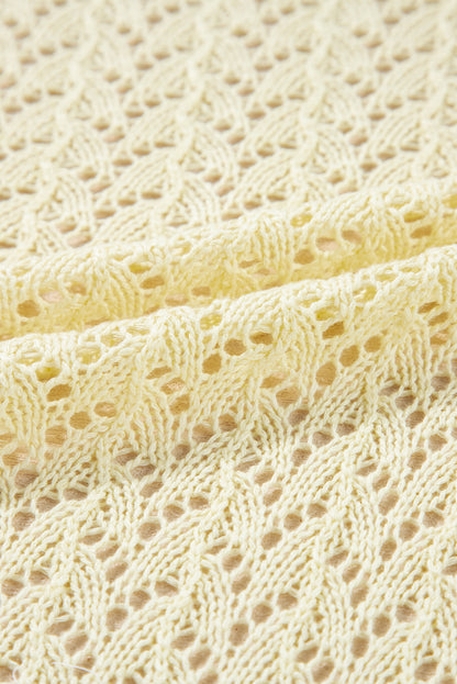 Gelbe creme pointelle-strickjacke mit offener vorderseite