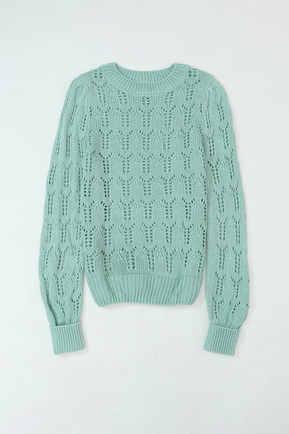 Grüner pointelle-pullover aus transparentem strick