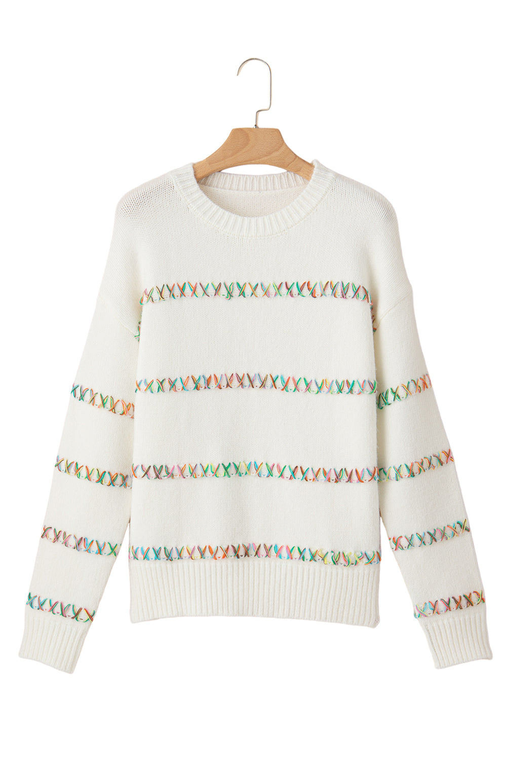 Weißer pullover mit gekreuzten schultern und bunten maschen