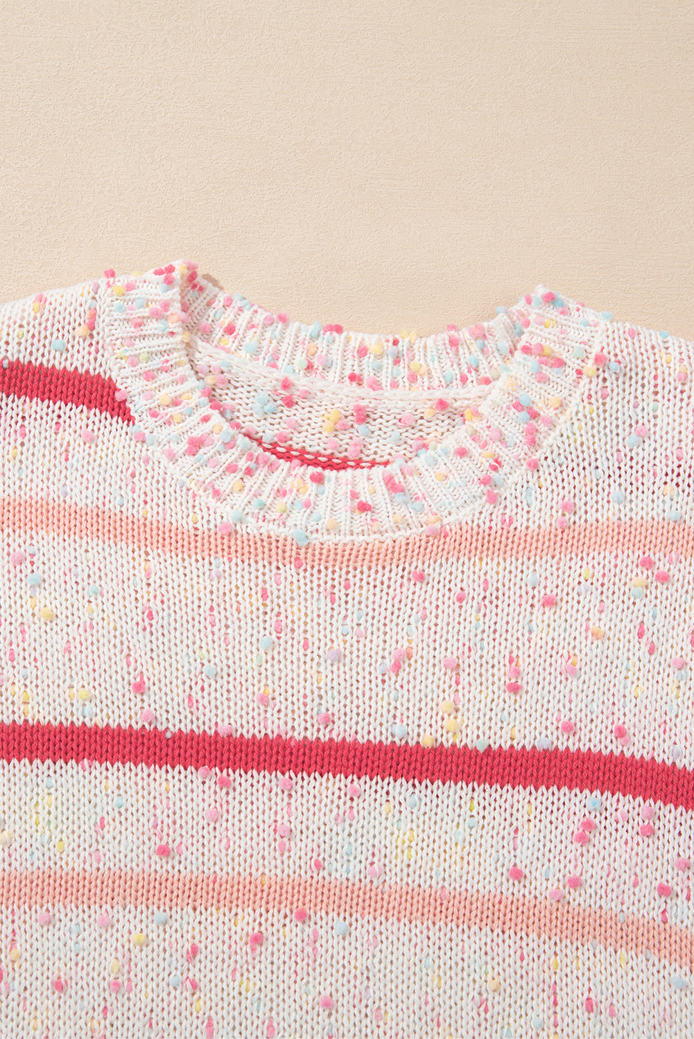 Rosa gestreifter konfetti-strickpullover
