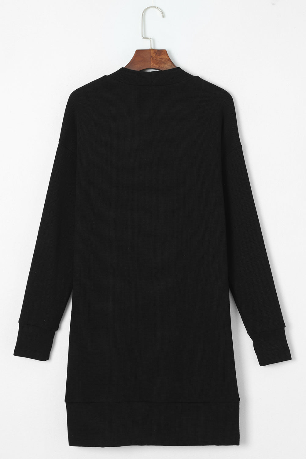 Schwarze thermo-waffelstrick-strickjacke mit taschen