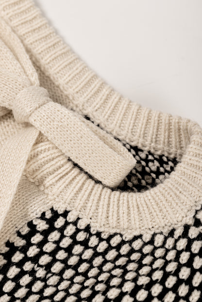 Schwarzer neutraler colorblock pullover zum binden