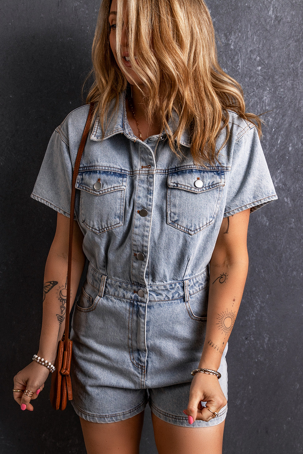 Hellblauer vintage washed buttons pocketed denim romper