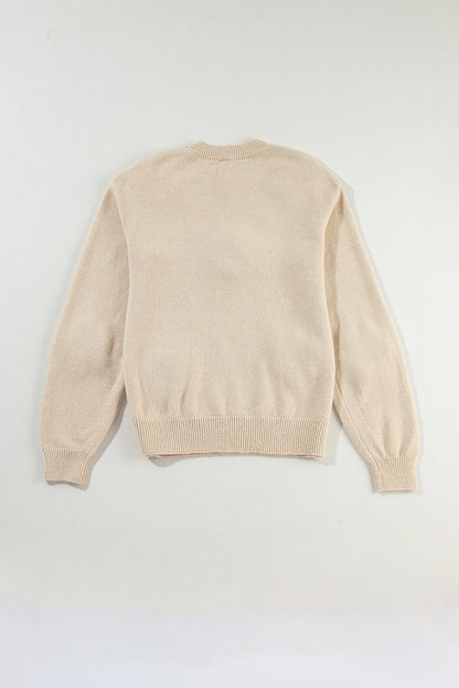 Pergamentfarbener, gehäkelter grobstrick-pullover