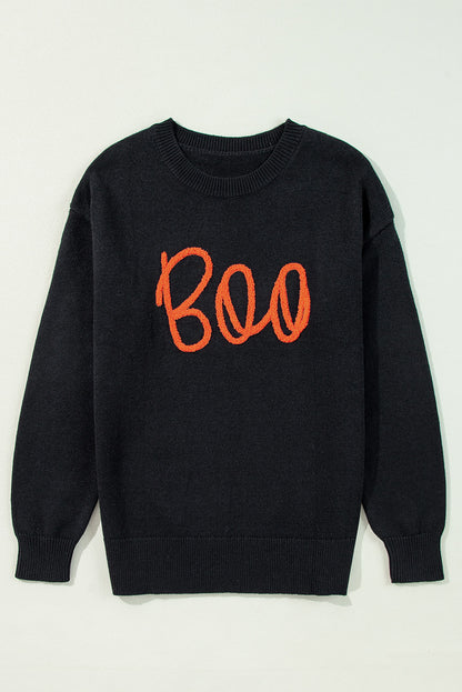 Schwarzer boo strickpullover mit geripptem rand und schultern