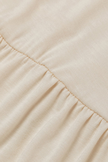 Beige verschönertes kleid mit puffärmeln und gestufter a-linie