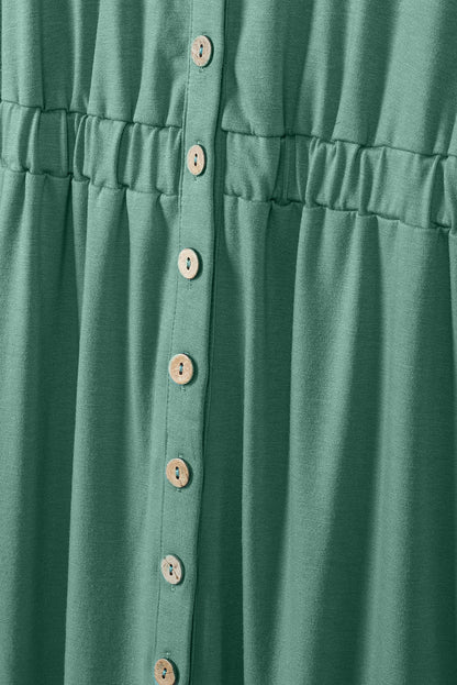 Grünes ärmelloses minikleid mit hoher taille und knöpfen