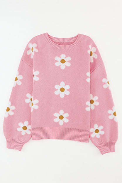 Rosa pullover mit blumenmuster und schultern