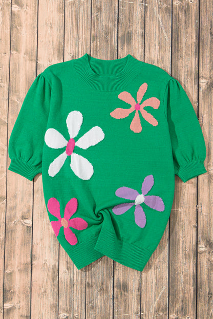 Leuchtend grüner, geblümter kurzarmpullover mit blasen