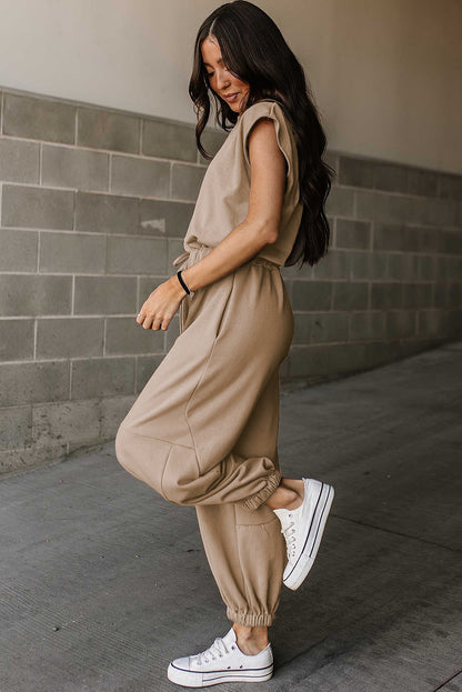 Light french beige cap sleeve open back drawstring jogger jumpsuit