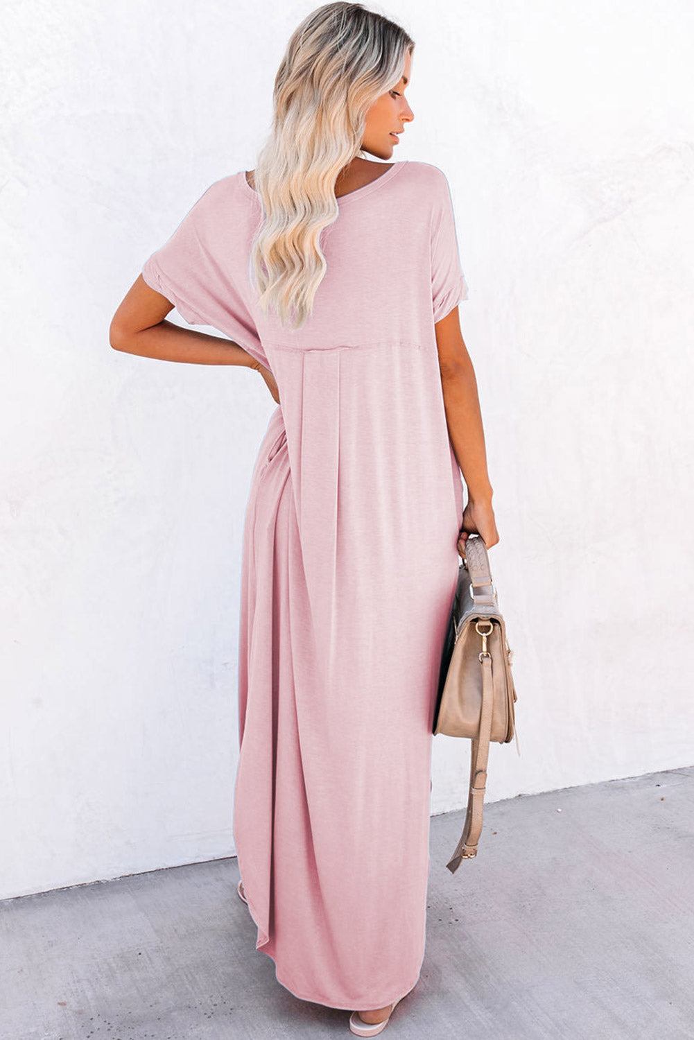 Rosa v-ausschnitt mit versteckten taschenschlitzen maxi-t-shirt-kleid