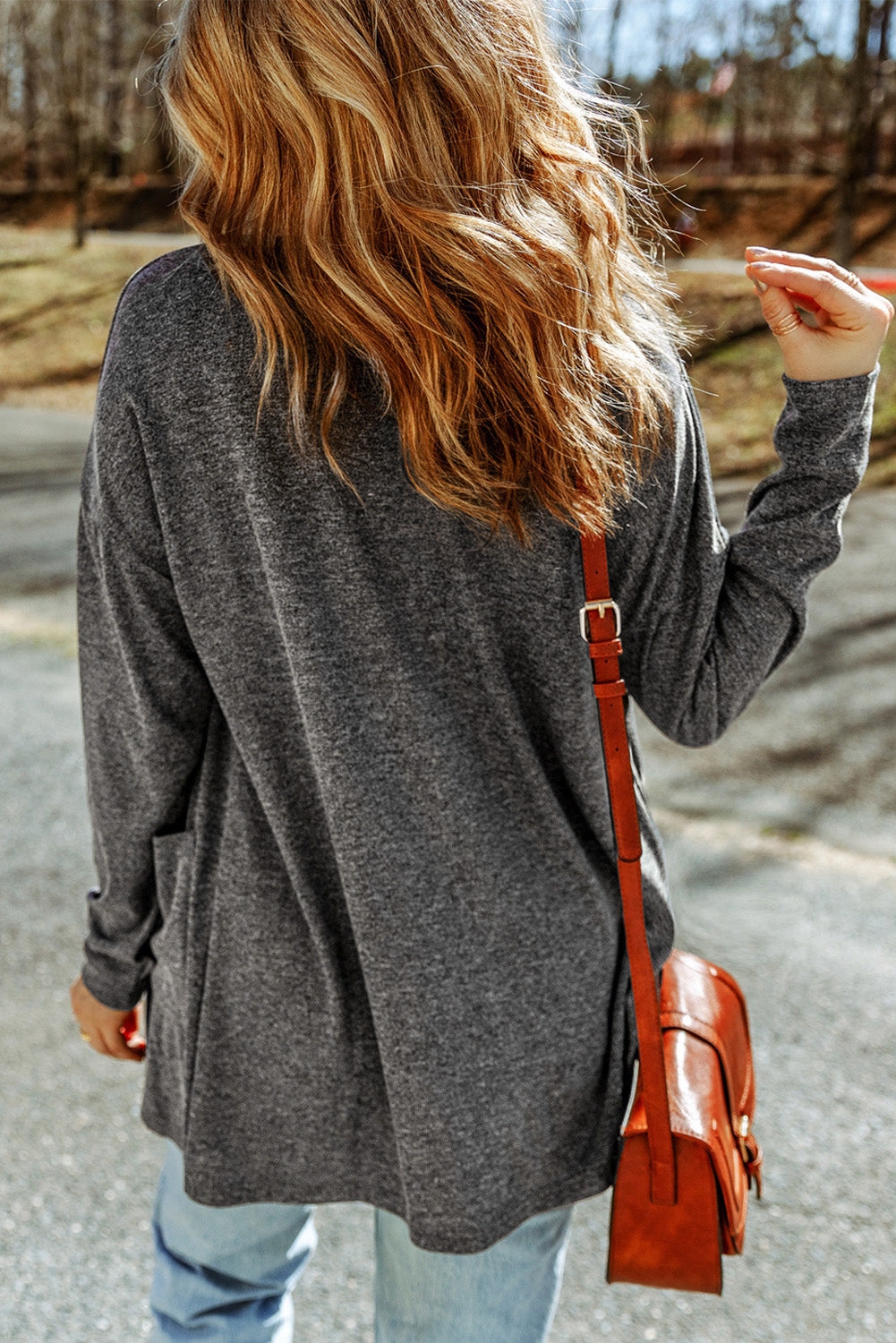 Strickjacke mit taschen und knopfleiste in grauem heidekraut
