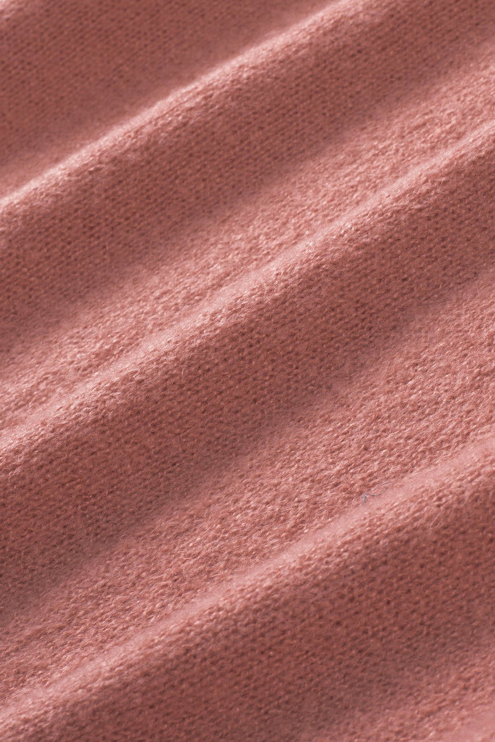 Unifarbener pullover mit puffärmeln und taschen