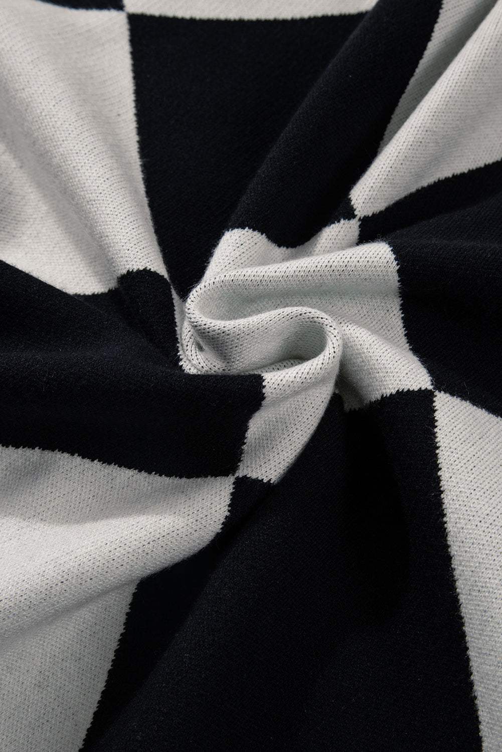 Schwarzer colorblock-cardigan mit geknöpften schultern und lockerer passform