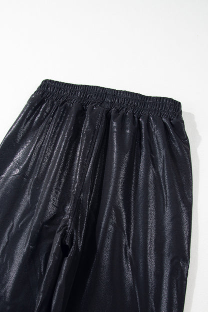 Schwarze kiesel-jogger mit elastischer taille
