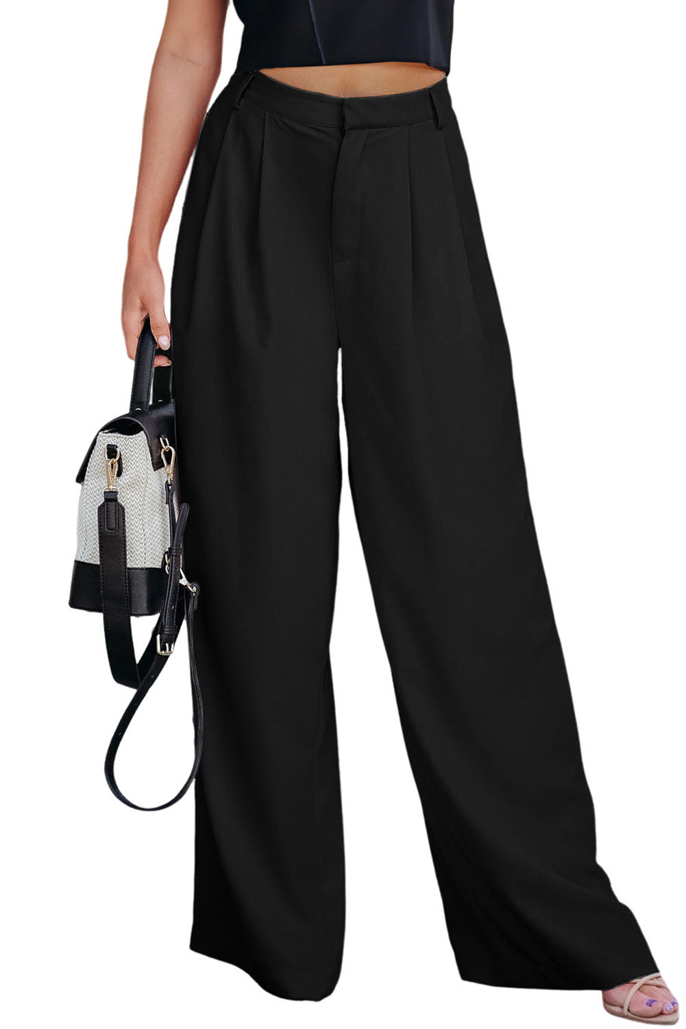 Schwarze plissierte elegante hose mit weitem bein