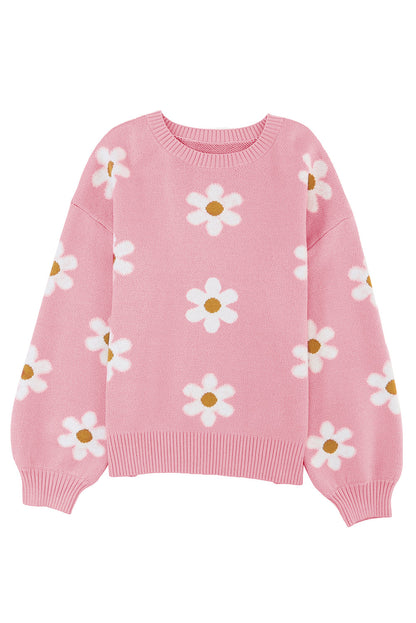 Rosa pullover mit blumenmuster und schultern
