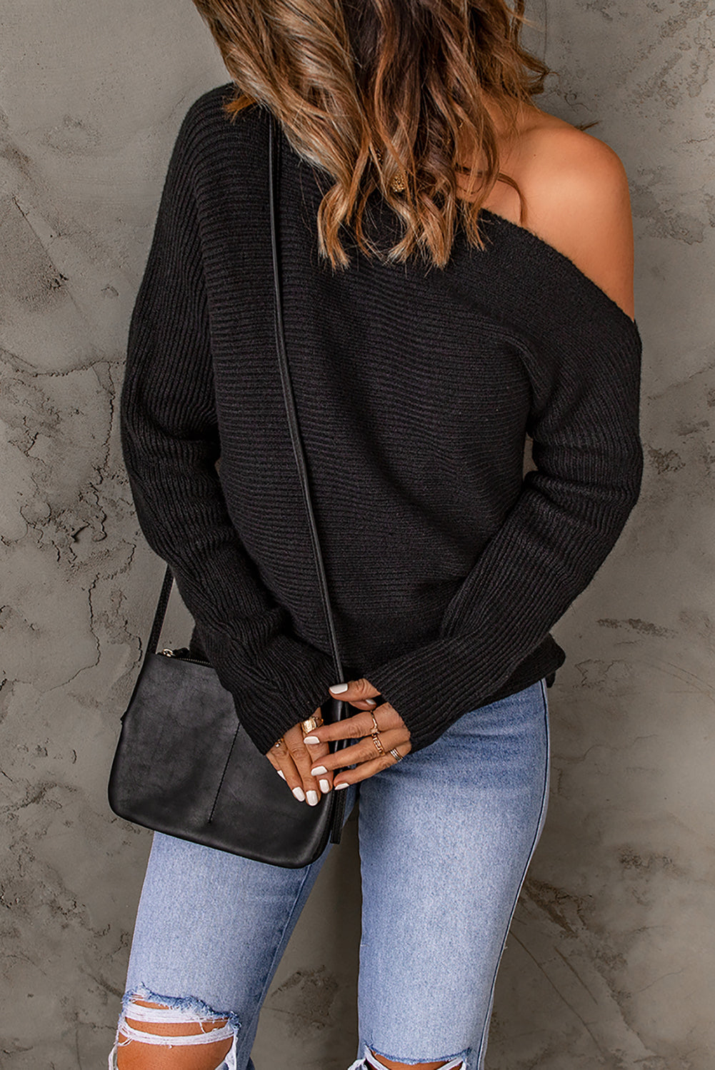 Schwarzer gestreifter langarm-strickpullover