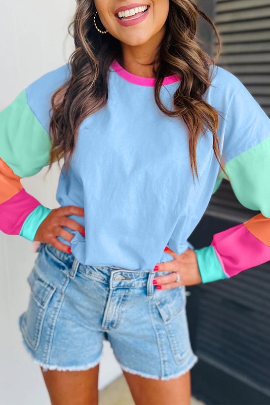 Dunkelblaues colorblock patchwork-langarm-top mit lockeren ärmeln