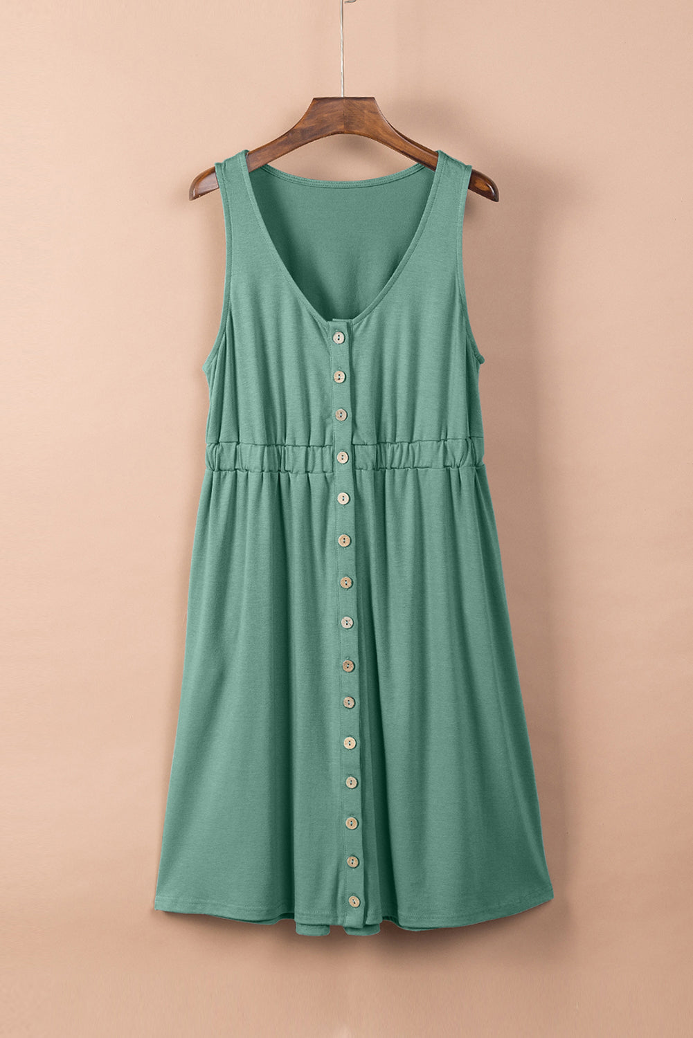 Grünes ärmelloses minikleid mit hoher taille und knöpfen