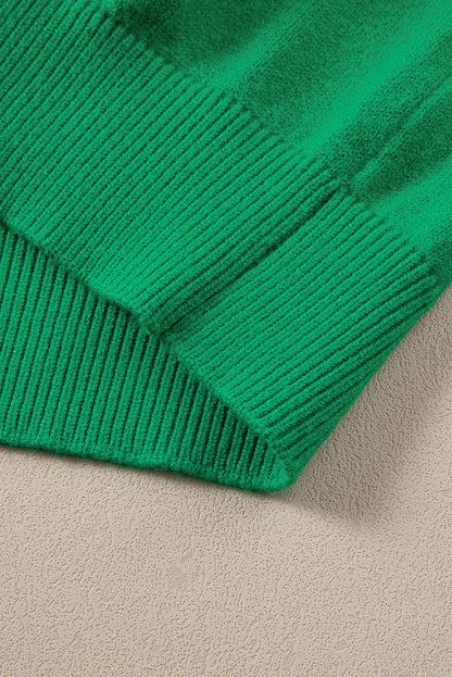 Leuchtend grüner, geblümter kurzarmpullover mit blasen