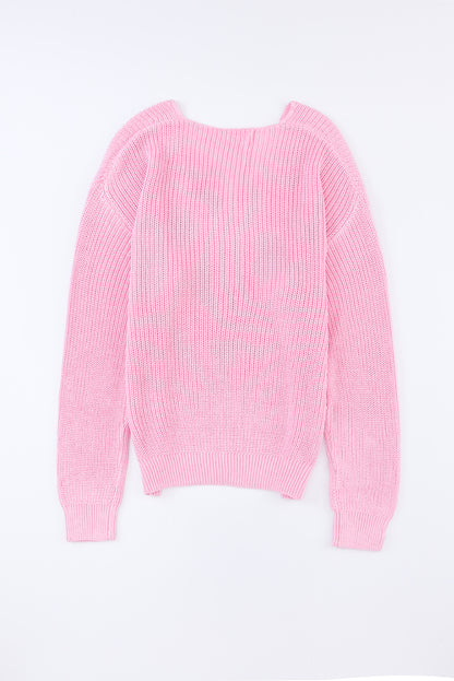 Rosa pullover mit v-ausschnitt aus rippenstrick