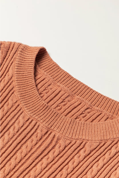 Goldener floraler patchwork-pullover mit gerüschter manschette und kabelstrick