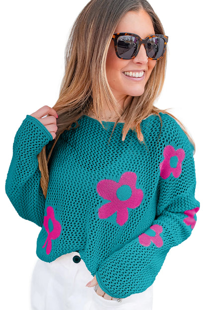 Meergrüner pullover mit großer blume und hohlen schultern aus strick