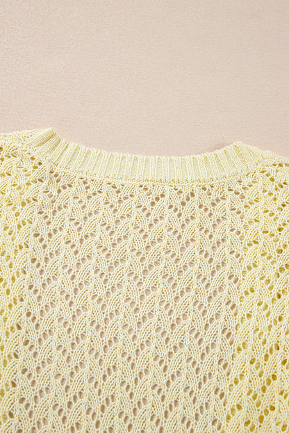 Gelbe creme pointelle-strickjacke mit offener vorderseite