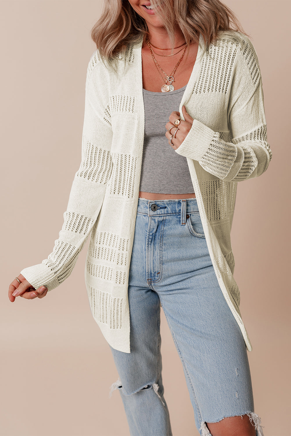 Weiße, einfarbige, leichte, offen gestrickte tunika-strickjacke