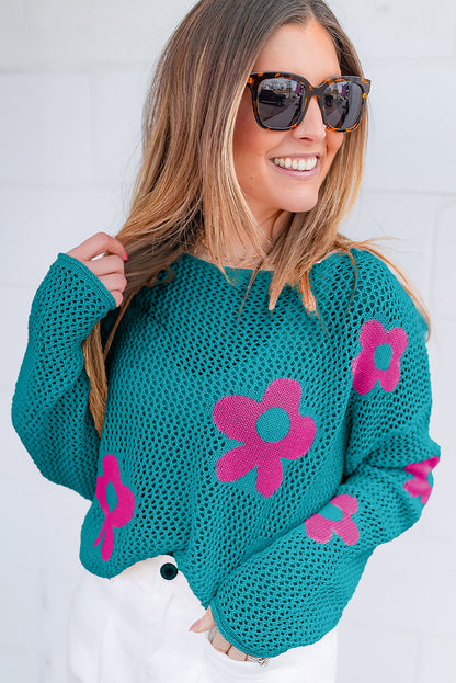 Meergrüner pullover mit großer blume und hohlen schultern aus strick