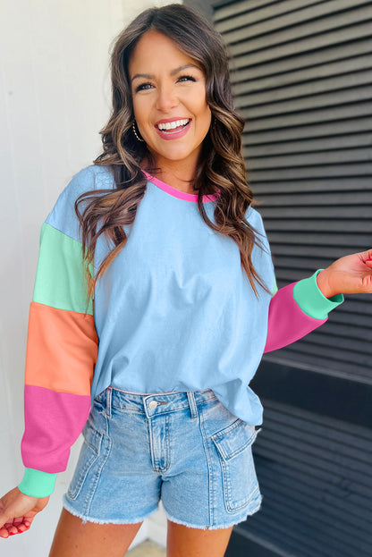 Dunkelblaues colorblock patchwork-langarm-top mit lockeren ärmeln