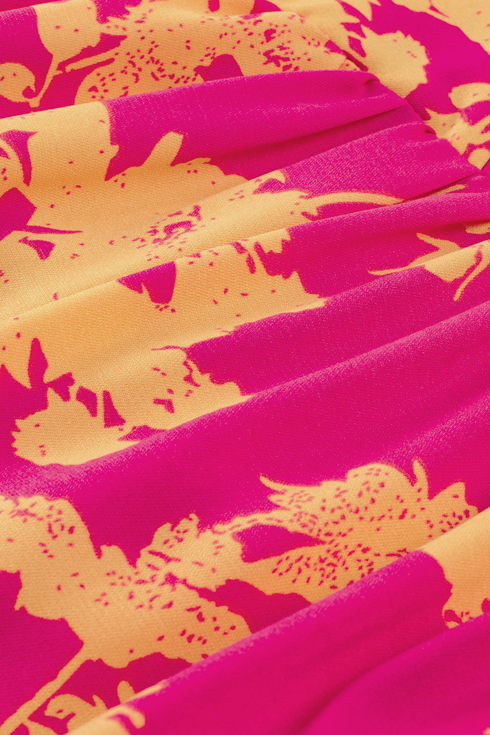 Rosafarbenes Kleid mit Fledermausärmeln und Blumendruck