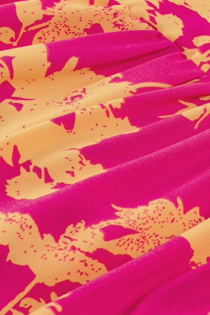 Rosafarbenes Kleid mit Fledermausärmeln und Blumendruck