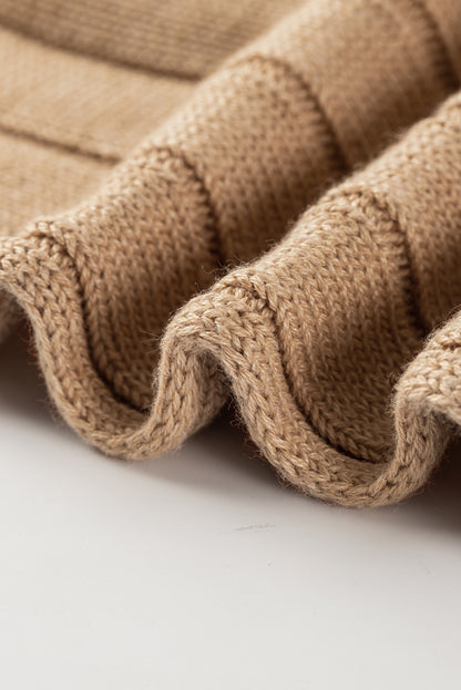 Braunes rippenstrick-dolman-top mit offener naht