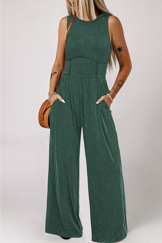 Schwarzgrüner ärmelloser jumpsuit mit weitem bein und geschnürter taille