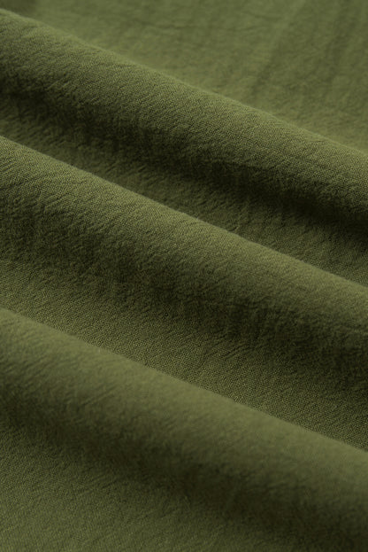 Grüne hose mit kordelzug und elastischer taille lange, gerade hosenbeine