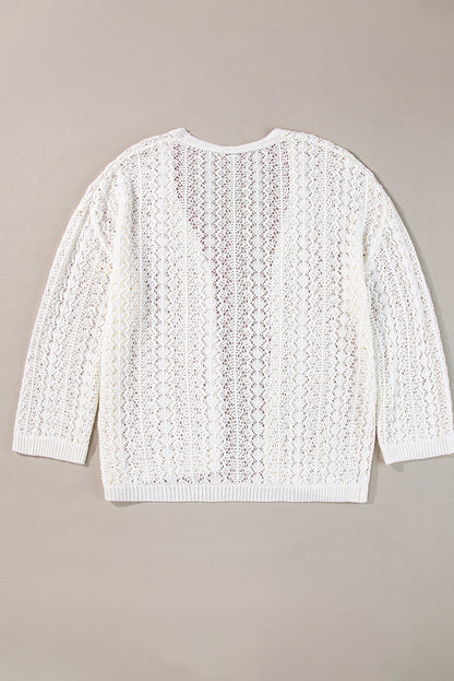 Weißer modischer strickcardigan mit hohlen schultern