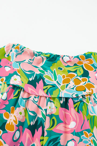 Grüner mix tropical print trägerloser geraffter jumpsuit
