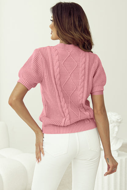 Rosa kabelstrickpullover mit gemischter struktur und kurzen ärmeln