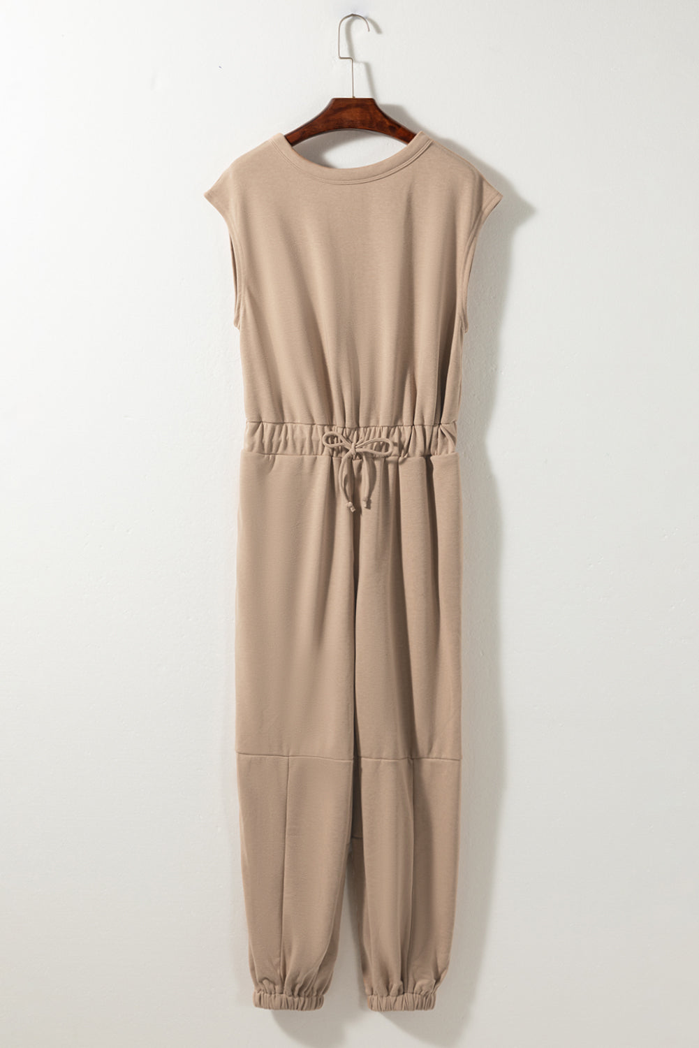 Light french beige cap sleeve open back drawstring jogger jumpsuit