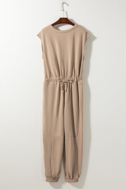 Light french beige cap sleeve open back drawstring jogger jumpsuit