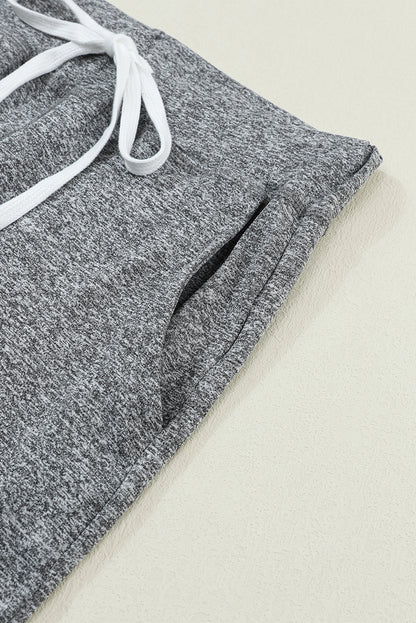 Graue jogginghose mit kordelzug an der taille