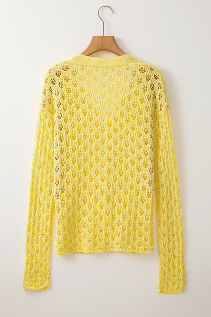 Gelber pointelle-strickpullover mit v-ausschnitt strickjacke