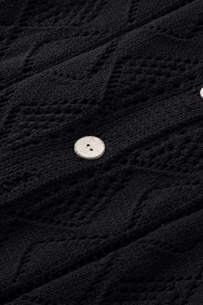 Schwarze durchbrochene strickjacke mit lochmuster