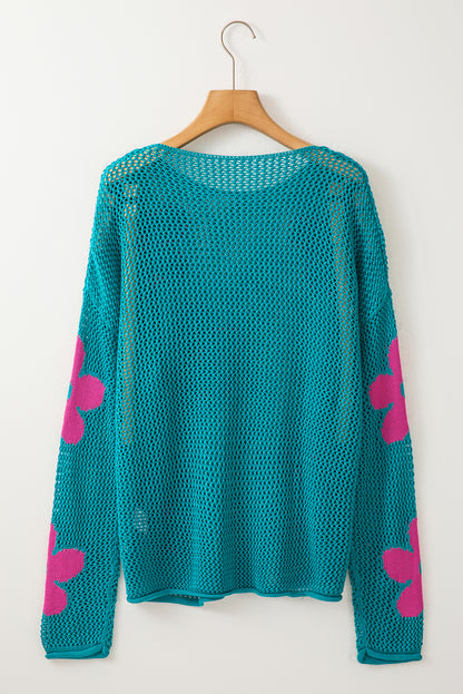 Meergrüner pullover mit großer blume und hohlen schultern aus strick