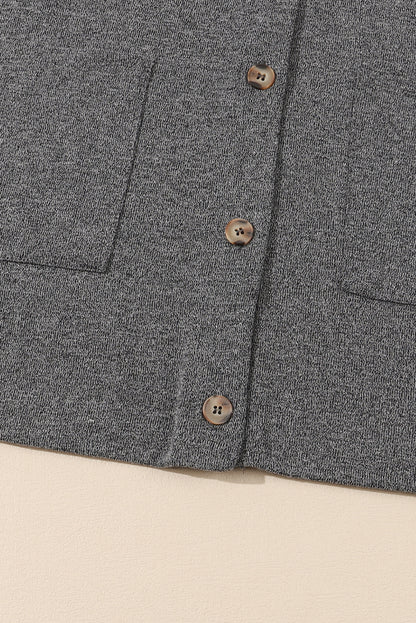 Strickjacke mit taschen und knopfleiste in grauem heidekraut