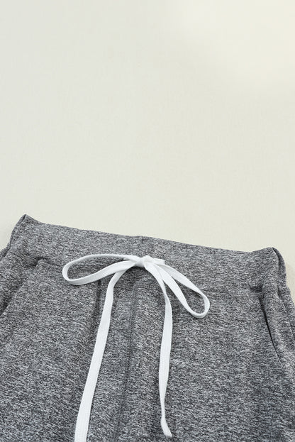 Graue jogginghose mit kordelzug an der taille