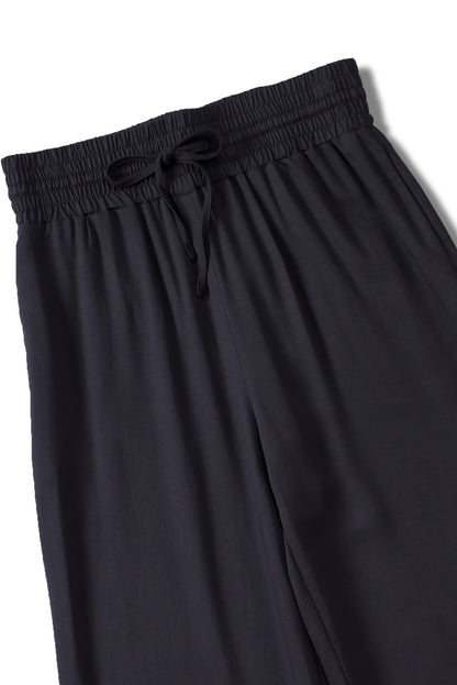 Schwarzer kordelzug elastische taille lässige hose mit weitem bein